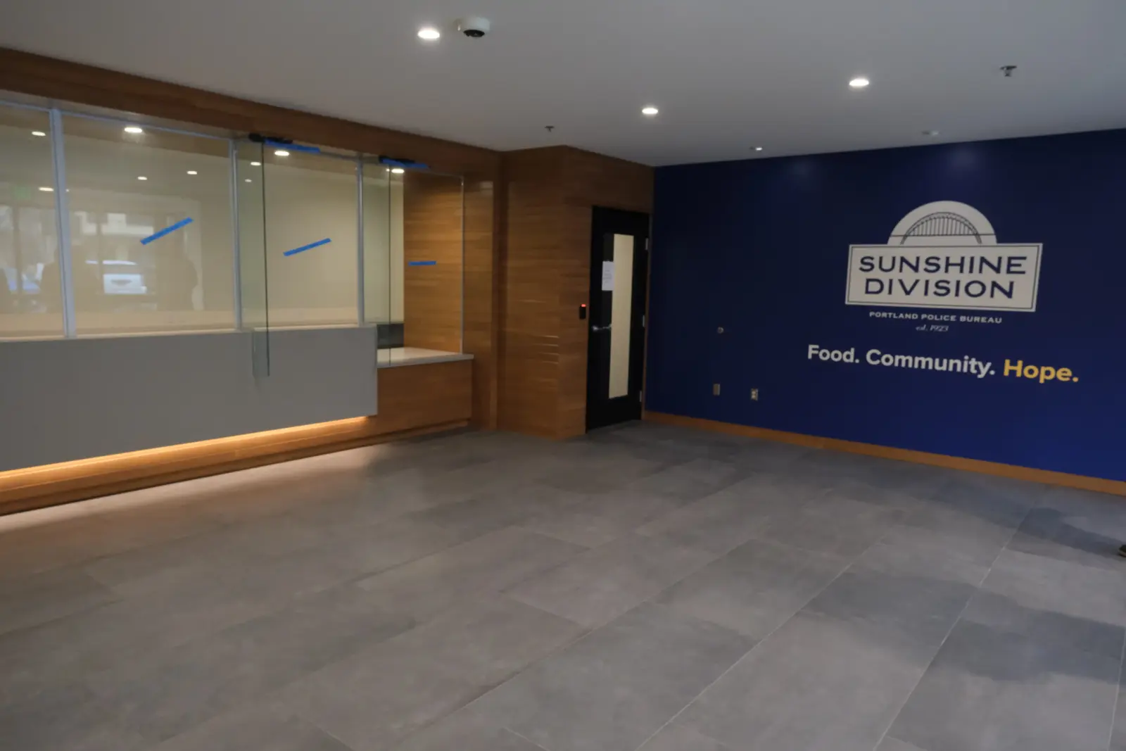 Volunteers packing food into food boxes